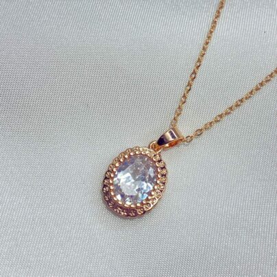Buy Rose Gold Brass Oval Shape Pendant with Sterling AAA+ Stones