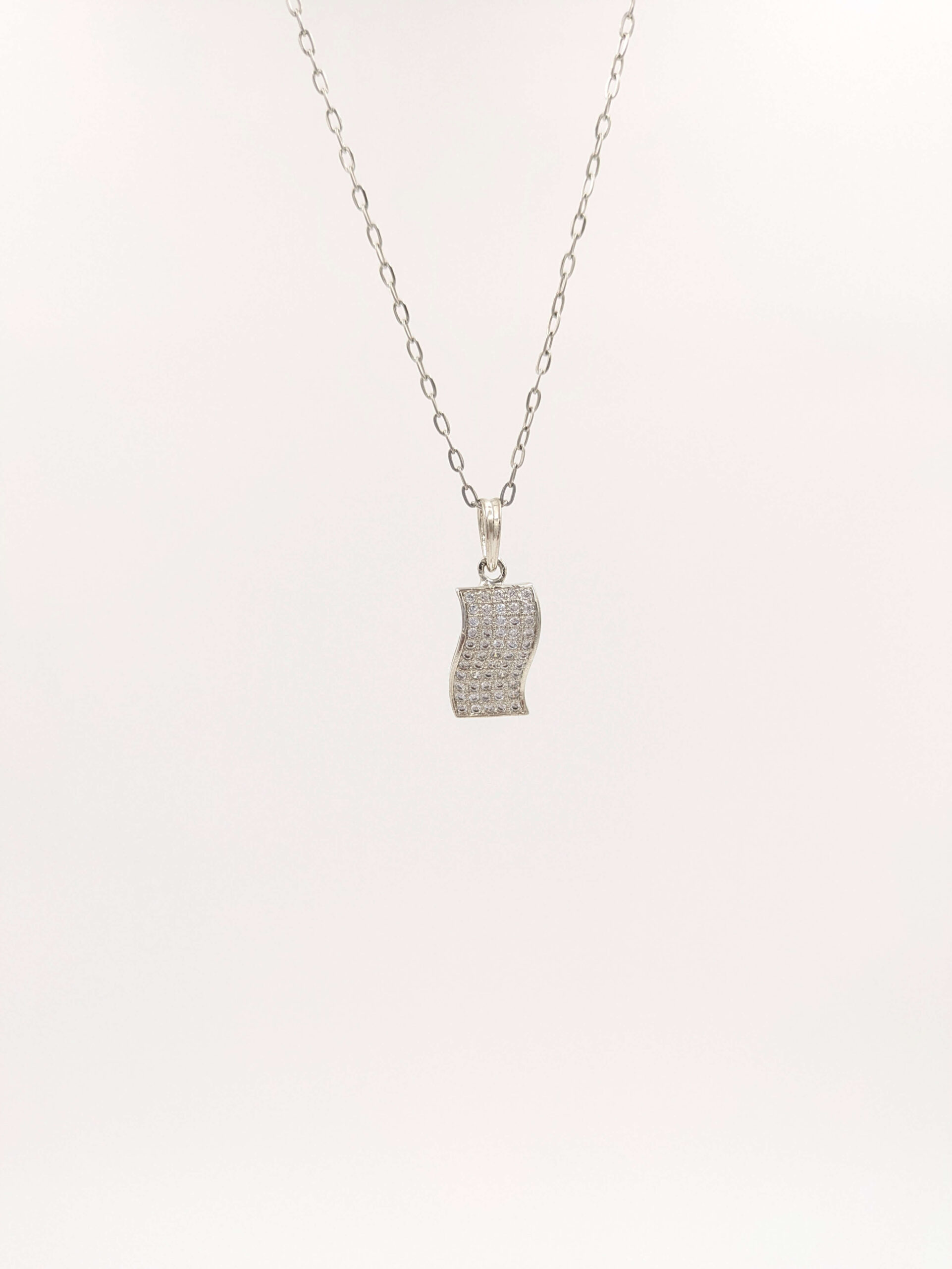 Elegant Zircon Swirl Pendant